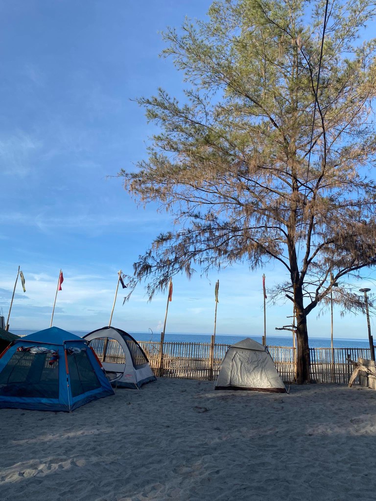 Beachfront camping setup at Playa del Amor